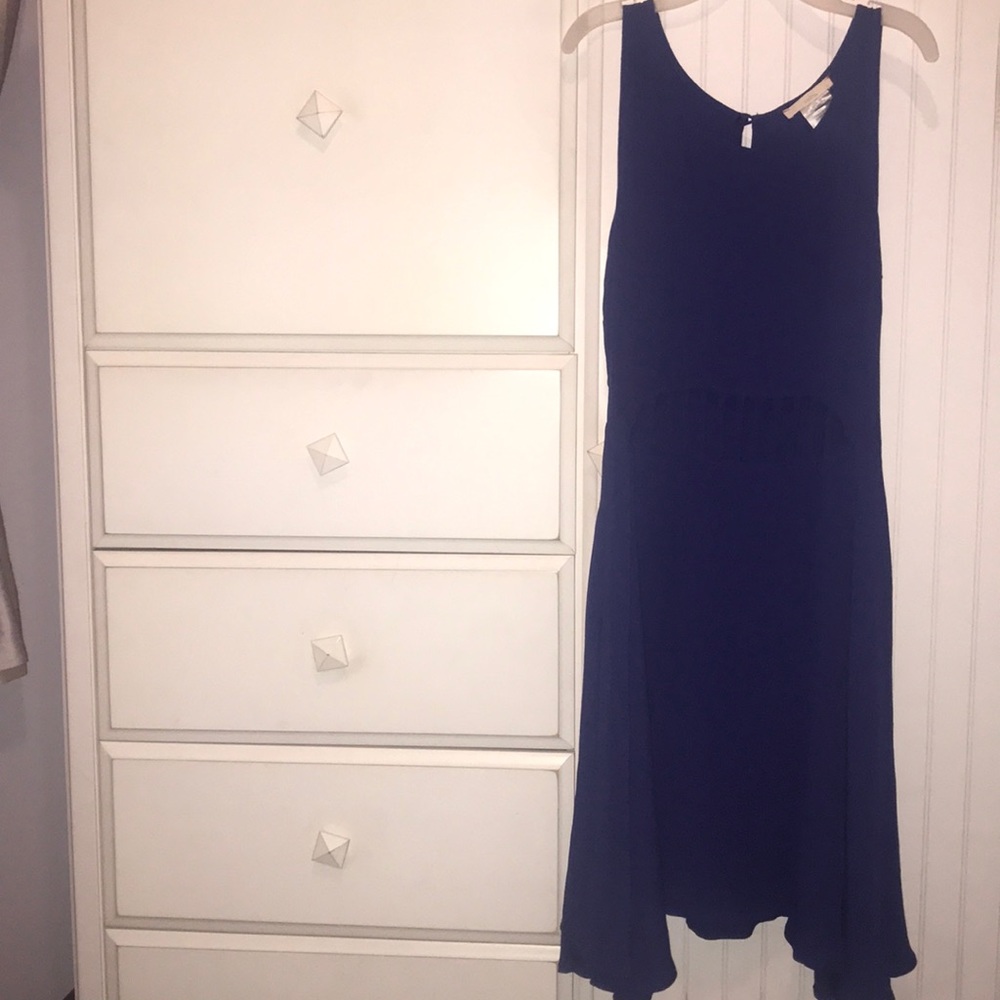 cutout on stomach strips of fabric down cutout